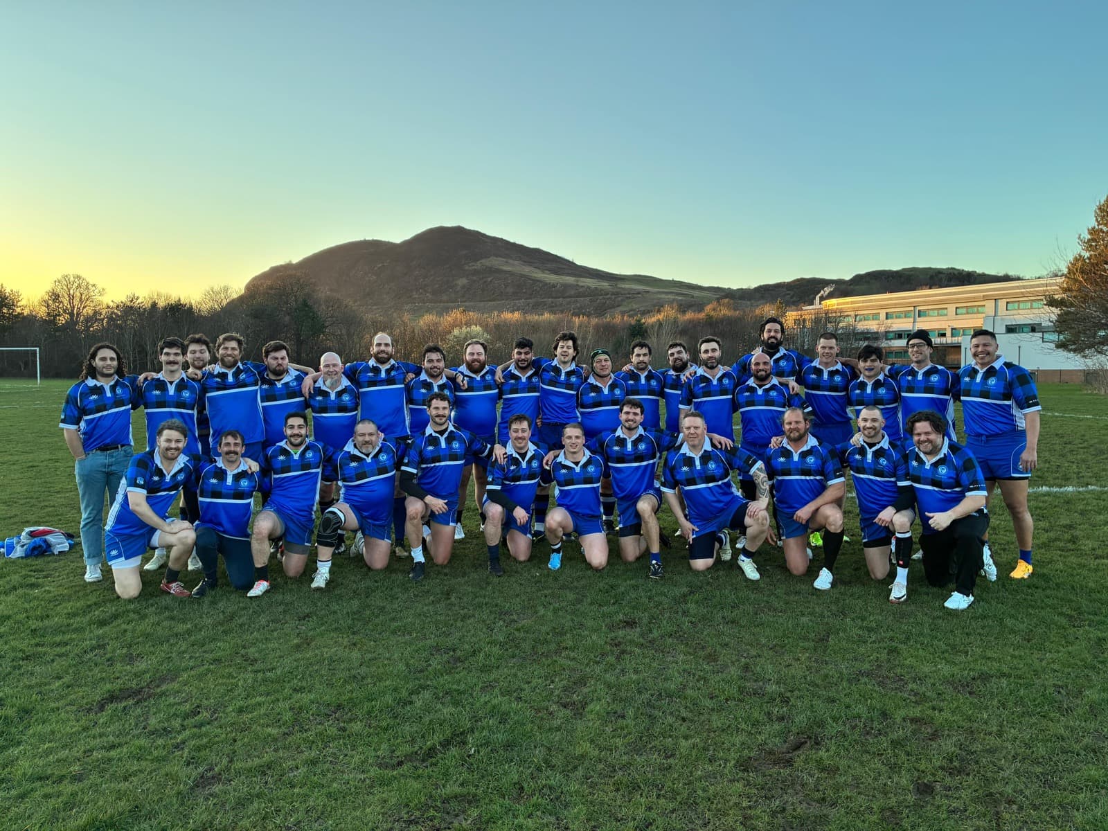 Brooklyn Rugby FC team photo on the pitch in Edinburgh